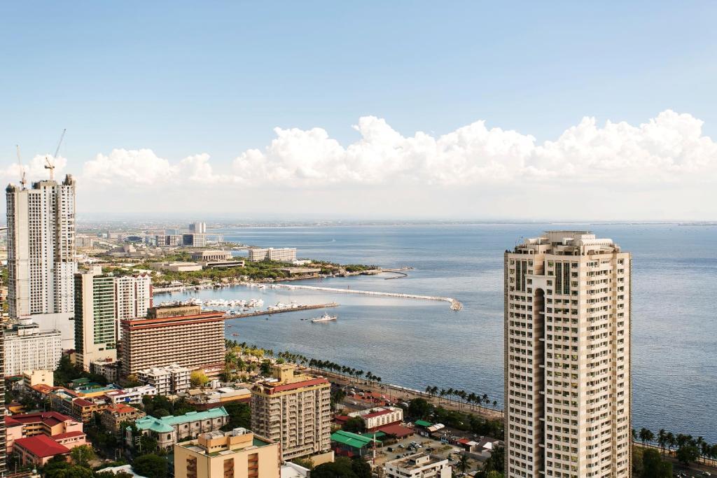 Jmm Apartment Suites Manila Quarto foto